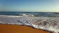 Sea Foam Shore Line on Sand