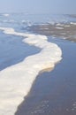 Sea foam wave on ocean beach