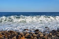 Sea foam from the waves in the bay of Akhlestyshev off the coast of the island Russian. Russia, Vladivostok