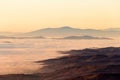 Sea of fog and between mountains and hills Royalty Free Stock Photo