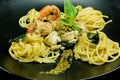 Sea food Basil Spagetthi in black Royalty Free Stock Photo