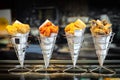 Sea food in cones at counter in smal street shop in Spain Ã¢â¬â snack with mixed takeaway grilled fish and fried seafood