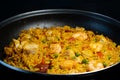 Sea Food Home made Paella Valenciana. Typical Spanish seafood paella in traditional pan. Close-up. Selective focus Royalty Free Stock Photo