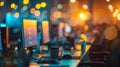 A sea of glowing computer screens and tered coffee cups forms a hazy backdrop capturing the Silicon Valley vibe of Royalty Free Stock Photo
