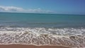 Sea with green-blue tones and clear sky