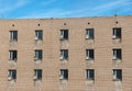 Sea gulls nesting on window sills of the abandoned building in the Russian ghost town Pyramiden in Svalbard archipelago