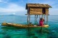 The sea gypsy on the hand carved canoe in Tetagan Island Semporna Sabah Malaysia