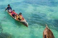 Sea Gypsy Kids on their sampan