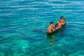 Sea Gypsy Kids on their Sampan