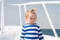 Sea is his vocation. Baby boy enjoy vacation cruise ship. Child cute sailor yacht sunny day. Boy adorable sailor striped Royalty Free Stock Photo