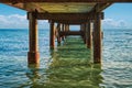 Sea horizon with fishing pier on foreground