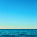 Sea horizon and serene blue sky