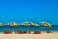 Sea,Island,umbrella,Thailand, Khai Island Phuket, Sun beds and sun umbrellas on a tropical beach Royalty Free Stock Photo