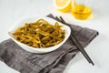 Sea kale kelp salad with oil and lemon in a white plate, white b Royalty Free Stock Photo