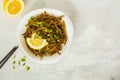 Sea kale kelp salad with oil and lemon in a white plate, white b Royalty Free Stock Photo