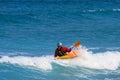 Sea Kayak turning on a wave Royalty Free Stock Photo