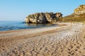 Sea lagoon with a sandy beach at sunset Royalty Free Stock Photo