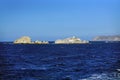 sea landscape and cliffs with a small solitary church near the island of Paros