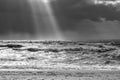 Sea landscape with huge waves and a lightbeam in Sylt Royalty Free Stock Photo