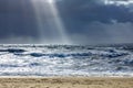 Sea landscape with huge waves and a lightbeam in Sylt