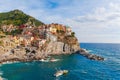Sea landscape in Manarola village, Cinque Terre coast of Italy. Scenic beautiful small town in the province of La Spezia, Liguria Royalty Free Stock Photo