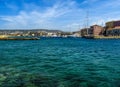 A sea-level view across Chania harbour, Crete on a bright sunny day