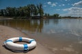 Sea life saver float on the river surface Royalty Free Stock Photo