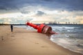 Sea mark buoy on the beach of Baltic sea