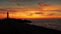 Orange sunset and sea moll