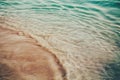 sea ocean green blue wave water, sandy beach background with copyspace. Toned with retro vintage film Royalty Free Stock Photo