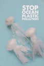 Sea and ocean life from waste. Jellyfishes out of plastic waste on blue background. Pollution of the planet Royalty Free Stock Photo