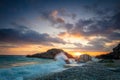 Sea Ocean Morning. Wave hit the rock at beach, sea water splash up to the sky with sun. Sunset Sundown at Sea. Storm. Nature Royalty Free Stock Photo