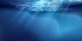 Sea or ocean surface seen from underwater, background. Surface seen from under water. Rays of light, abstract marine backdrop. Royalty Free Stock Photo