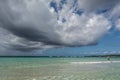 Sea or ocean water with blue sky and dramatic clouds Royalty Free Stock Photo