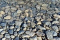 Sea ocean water pebble stones on seashore beach Royalty Free Stock Photo