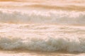 Sea ocean water surface with foaming small waves. Amazing landscape scenery. Ocean water foam splashes washing sandy Royalty Free Stock Photo