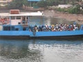 Sea.ocean watertranport.market.river.men`women`goa. curuz moter bote terawal Royalty Free Stock Photo