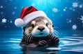 sea otter wearing Santa hat in water against blue background with falling snowflakes in light. concepts: Christmas, New Royalty Free Stock Photo