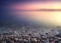 Sea pebble. Nature composition of sunset. Royalty Free Stock Photo