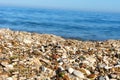 Sea pebbles sand on the background of the sea