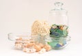 Sea pebbles and shells in glass containers Royalty Free Stock Photo