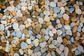 Sea pebbles. Small stones gravel texture background. Pile of pebbles, thailand. Color stone