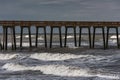 Sea pier in cloudy stormy weather Royalty Free Stock Photo