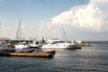 Sea pier with many yachts
