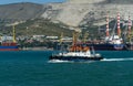 Sea Pilot `Adis` is sailing in blue water Black Sea. White work boat `Adis` on Novorossiysk Commercial Sea Port