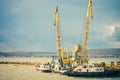 Sea port Crane and ships cargo industrial Royalty Free Stock Photo