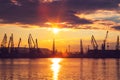 Sea port and industrial cranes, Varna, Bulgaria.Sunset over the Varna lake Royalty Free Stock Photo