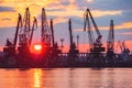 Sea port and industrial cranes, Varna, Bulgaria.Sunset over the Varna lake Royalty Free Stock Photo