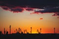 Sea port and industrial cranes, Varna, Bulgaria.Sunset over the Varna lake Royalty Free Stock Photo