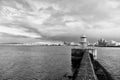 Sea port navigation concept. Sea transportation and navigation. Lighthouse on sea pier in reykjavik iceland. Lighthouse Royalty Free Stock Photo